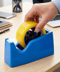 Pack Of Two Top Tier Tape Dispenser Core Replacement 36mm Plastic Insert Wheel in blue holder with yellow tape being used.