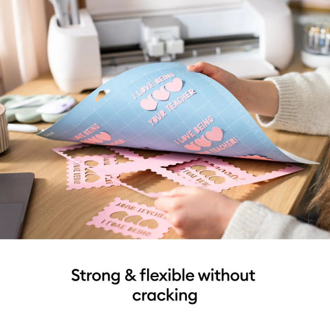 Person using LightGrip Cutting Mat Pack 6 Pack 12x12 Inches For Lightweight Paper Cardstock And Printables Reusable Durable Mats