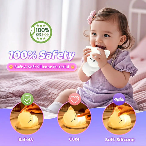 Child holding Kids Night Light Cat Lamp With 16 Color Modes, Dimmable And Rechargeable Silicone Nightlight For Nursery