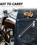 Person with Compact Motorcycle Tool Kit With Pliers, Double Ended Spark Plug Socket, Screwdriver, Wrenches, And Storage Bag in pocket