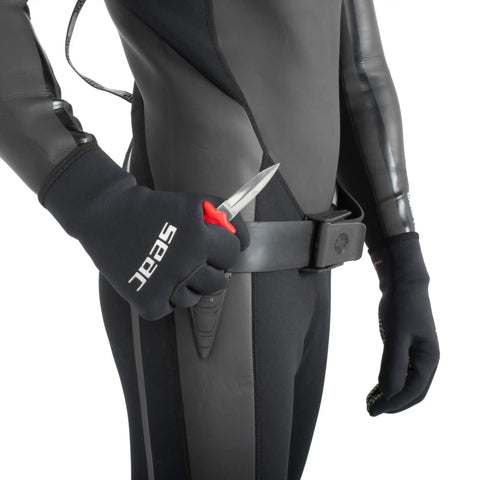 Diver holding Samurai Underwater Dive Knife With 2.7-Inch Tempered Stainless Blade, 5.9-Inch Overall, Four Color Handles White Black Red Green.