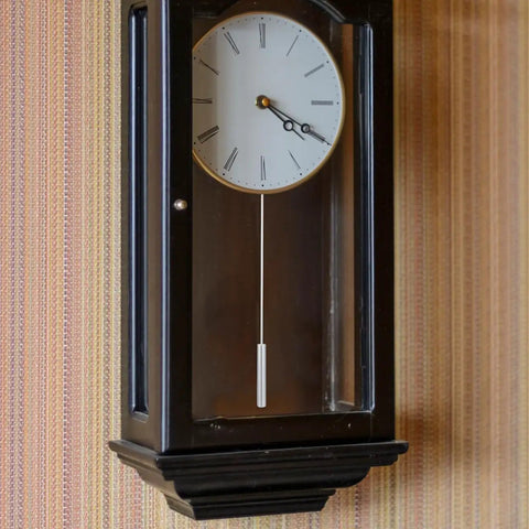 DIY Clock Pendulum Replacement Cylinder for Wall Clocks 10.62 Inch Metal Pendulum shown in use in a wooden wall clock