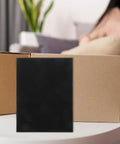 4 Piece Cuttable Foam Inserts For Toolboxes And Fragile Item Protection Black Soft Padding in front of a cardboard box