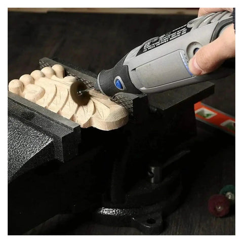 Premium Small Nylon Fiber Grinding Heads For Rotary Tool Buffing Set polishing carved wood in a vise with precision rotary tool.