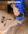 630W Compact Wood Router With Fixed Base And Beast Mode 35000 Rpm Motor trimming curved wood with router bits and dust.
