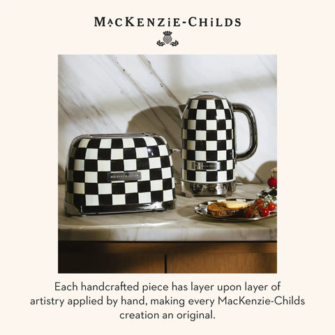 Electric Kettle With Stainless Steel Body In Black And White Courtly Check Pattern For Quick Boiled Water A Game Changing Pick For Tea Or Coffee In A Modern Kitchen next to matching toaster on counter