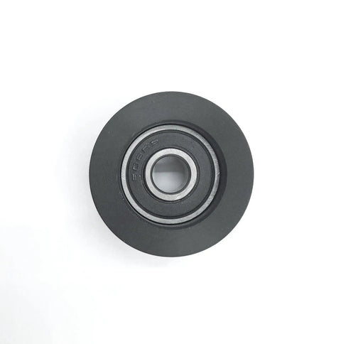 Single roller from the 4 Pack Tile Saw Table Roller Replacement For Ridgid R4030 R4030S 7 Inch Saw OEM Equivalent, black with bearing in center.