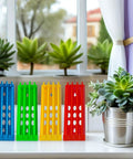 4 Pack Pigeon Ring Stands And Poultry Leg Band Racks For Easy Pro Grade Band Management on a windowsill with plants