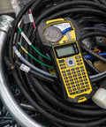 Top Shelf Portable Color Label Maker Kit With Rugged Carrying Case And Fast Swap Battery For Snappy Wire Tagging and Circuit Board Markers Easy Peasy Setup Delivers Knockout Prints Everyday on a surface with wires.