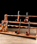 Premium Solid Wood Pipe Stand Featuring 16 Custom Cubbies Double Tier Desktop Tobacco Display Rack with pipes on display.