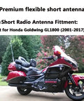 Honda Goldwing 7 Inch Spiral Flexible Motorcycle Antenna on GL1800 shown in outdoor setting with lush greenery.