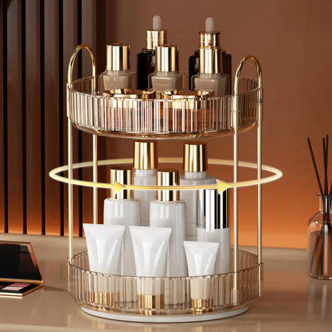 Kick Back And Organize Your Vanity Game With This Smooth Spin 360 Rotating Makeup Organizer Featuring Two Tier High Capacity Storage For Cosmetics Skincare And Perfume In Classic Amber Gold with clear tubes and jars.