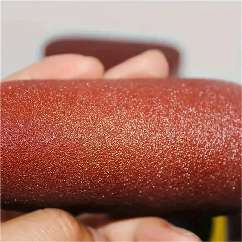 Close-up of a 4 inch aluminum oxide sanding disc from the 20 pack, ideal for wood, metal, and composite work.