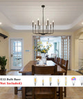 Eight Light Modern Black Farmhouse Chandelier For Dining Room Living Room Kitchen Foyer And Bedroom With Candle Style Illumination And 360 Degree Lighting For High Ceilings This Dope Fixture hanging over a dining table.
