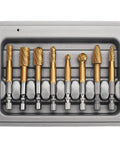 Front view: 8-piece carbide burr set with gold tungsten carbide bits in a gray plastic case