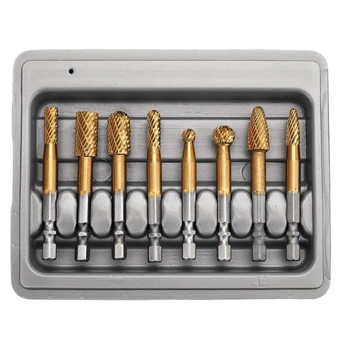 Front view: 8-piece carbide burr set with gold tungsten carbide bits in a gray plastic case