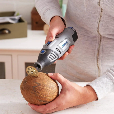 Person using rotary tool with 1-1/2 Inch EZ Lock Cutting Wheel For Wood And Laminate Fiberglass And Plastic Fast Cuts On Soft And Hardwood