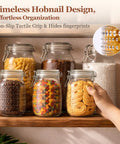 Glass Canister Set 34 Oz Each, 3 Pack Clear Jars For Coffee Bar Countertop, showing jars with pasta, candy, cookies.