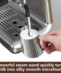 Heavy Hitter Espresso Machine With Built In Burr Grinder And Swift Milk Frother, 95 Oz Big Tank steam wand frothing milk into microfoam.