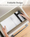 Roomy Clear Storage Sacks, Heavy Duty 60L Zippered Packing Bags For Seasonal Clothes And Bedding, folded and placed in a drawer.