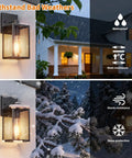 All Season Black Wall Sconces Built Tough To Beat The Elements With Heavy Duty Aluminum And Rainproof Glass E26 Socket Waterproof Exterior Lights For Porches Driveways And Garages Two Pack Set, shown against rain and snow backdrop.