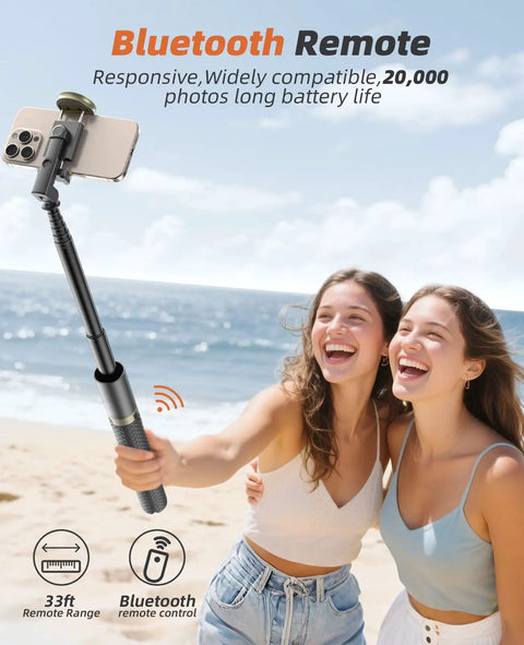 Two women using All In One Phone Tripod And Selfie Stick With Remote For iPhone And Android Ultra Portable And Lightweight 62 Inch Extendable Travel Stand For Vlogging And Video On The Go on a beach.
