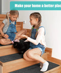 Two children sitting on stairs with Non Slip Stair Treads For Wood Steps 8 By 30 Inches 15 Pack Self Adhesive Indoor Carpet Protectors