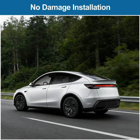 Sleek Rear Trunk Spoiler Tail Wing For Tesla Model Y Juniper 2025 2026 No Drill Install showcasing aerodynamic design on highway.