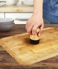 2 Pack Natural Bamboo Cutting Board Oil And Wax Applicator Set for even oiling on a bamboo cutting board
