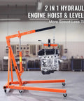 Tough As Nails Hydraulic Engine Hoist And Folding Crane With Integrated Leveler 2 Ton 4400 Lb Capacity in a garage setting.