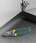 Pro Multi-Functional Cable Stripping Pliers With Ergonomic Handle For Precise Wire Gauge Adjustment on a concrete floor.