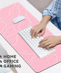 XL Gaming Mouse Pad 31.5 By 11.8 Inches With Non Slip Rubber Base And Stitched Edges, Pink Topographic Print on desk with keyboard