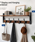29 Inch Rustic Wall Coat Rack With Shelf And Hooks Entryway Organizer For Living Room Bedroom Or Bathroom Heavy Duty Black Finish 80 Lbs Capacity Perfect Storage And Display showcasing shelf with decor and hooks holding coats and bags.