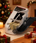 Beast Mode Fast Money Counter With UV Counterfeit Detection Portable Cash Counter For Bills on a festive table