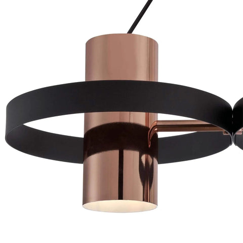 Close-up of Ariana Three-Light Indoor Chandelier with matte black finish and copper shades detail, modern design for sloped ceilings.