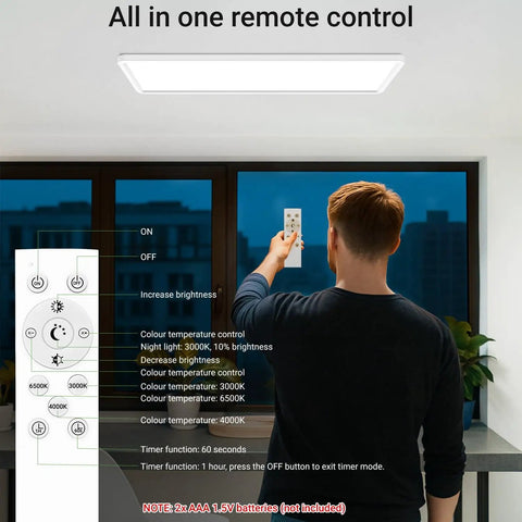 Person using remote control to adjust Flat Panel LED Light With Remote, 22.8x7.8 Inch, 32W, 3500LM, 3000K-6500K Adjustable Color Temperature