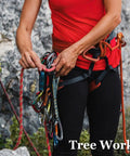 Person preparing with Half Inch By 100 Ft Double Braid Arborist Rigging Rope For Tree Work Climbing Hauling And Logging With High Tensile Low Stretch 48 Strand Polyester Bull Rope Orange.
