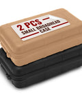 Stack of beige and black small waterproof boxes for hiking and travel, portable hard case with foam padding and tether loops.