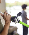 Woman holding Roam Spincast Reel And Telescopic Fishing Rod Combo Extendable Eighteen Point Five Inch To Six Foot Pole by water