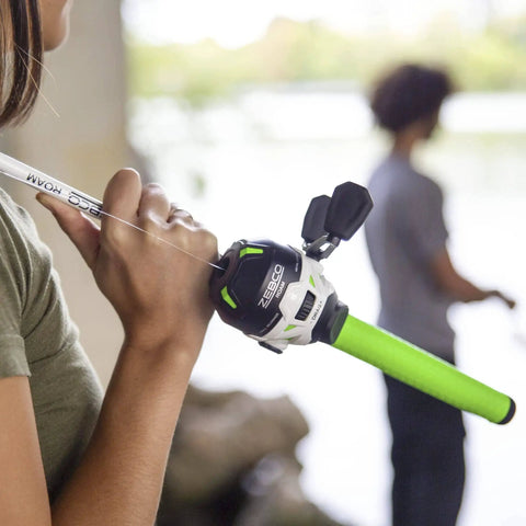 Woman holding Roam Spincast Reel And Telescopic Fishing Rod Combo Extendable Eighteen Point Five Inch To Six Foot Pole by water