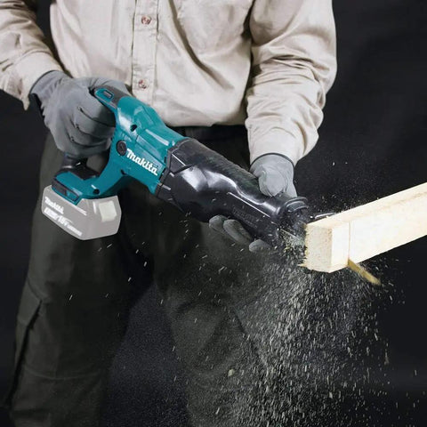Person using 18V Cordless Reciprocating Saw Tool Only With Variable Speed Trigger And Tool Free Blade Change for cutting wood