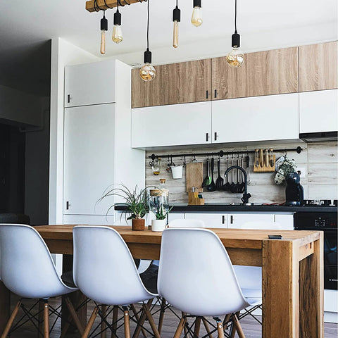 Modern kitchen with wooden table, white chairs, and cabinetry featuring 10 Pack Black Square Bar Cabinet Knobs 2 Inch Matte Black Square Cabinet Pulls.