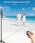 Person using Two Pack Wireless Remote Shutter for iPhone and Android Cameras Bluetooth Photo Clicker on beach with tripod