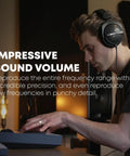 Person wearing DT 770 PRO 80 Ohm Closed Back Over Ear Studio Headphones With 3M Straight Cable And Limited Edition Black Velour Ear Pads