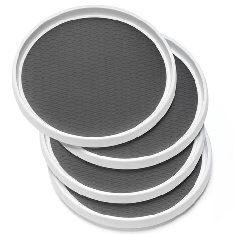 Four-Pack 10-Inch Non-Skid Lazy Susan Turntable Organizers stacked, gray silicone surface, BPA-free, for kitchens and pantries.