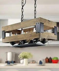 Modern Farmhouse Wood Chandelier With Clear Glass Cylindrical Shades Rectangular 22.4 Inch Light Fixture For Kitchen Island And Dining Room Six Lights Open Black Metal Frame Delivers Warm Cozy Vibe hanging in kitchen area