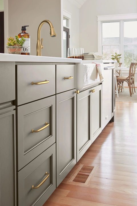 Renown Champagne Bronze Cabinet Pull Five And One Sixteenth Inch Center To Center Traditional Drawer Handle installed on kitchen cabinets