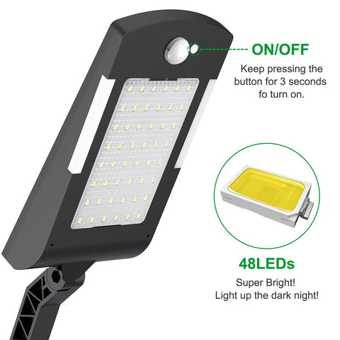 Close-up of solar powered outdoor LED lights with motion sensor, 48 LEDs flood light, waterproof security lighting for yard, garden, fence.