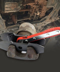 JoyFans brake caliper compression tool set with red handle and black spreader arms on a car brake caliper.