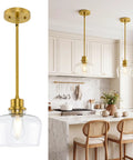 Emak 8 Inch Pendant Lights Kitchen Island, 1-Light Brushed Gold Kitchen Pendant Lights with Clear Glass Shade over kitchen island.